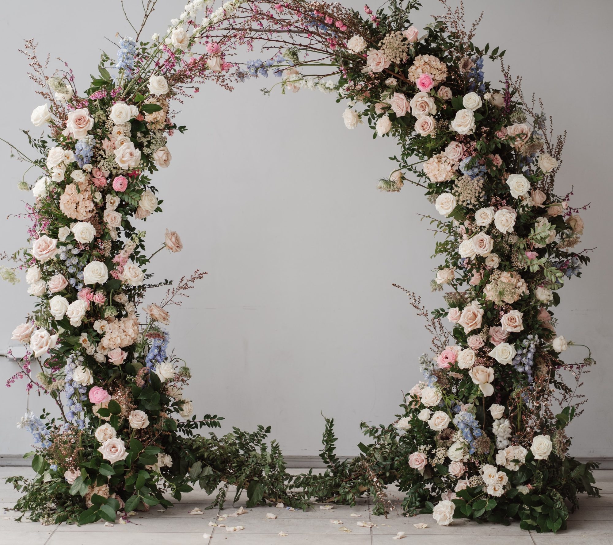 Long reception table with lavender and purple florals